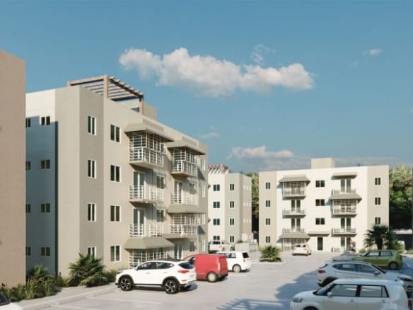 Vista principal de los Apartamentos en venta Ciudad Juan Bosch con áreas verdes
